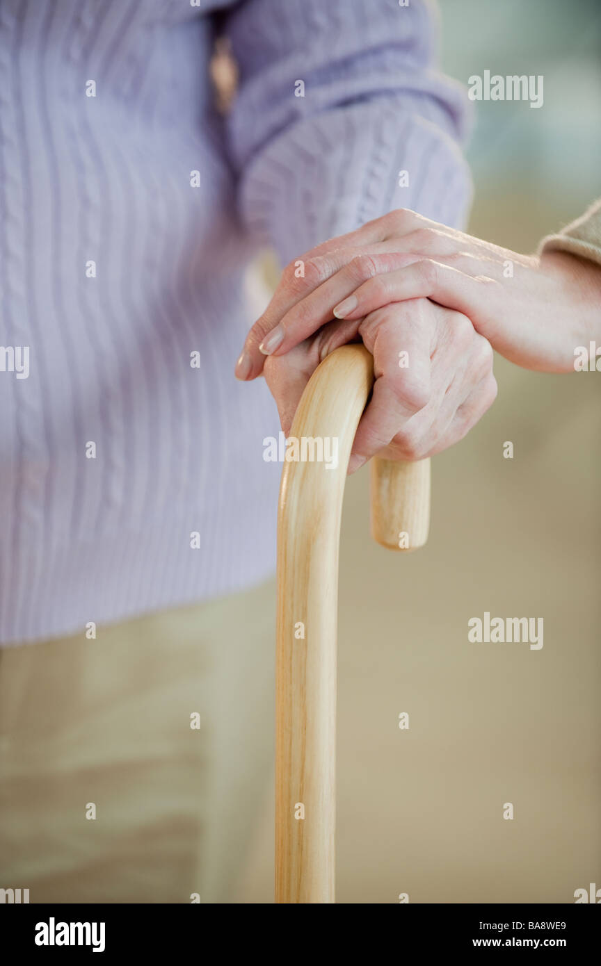 Close up of senior woman holding cane Banque D'Images