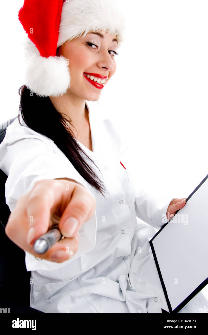 Jeune médecin wearing christmas hat Banque D'Images