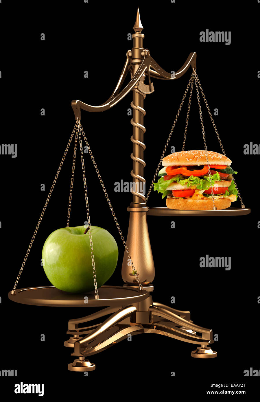 Hamburger et Apple sur des échelles de poids Banque D'Images