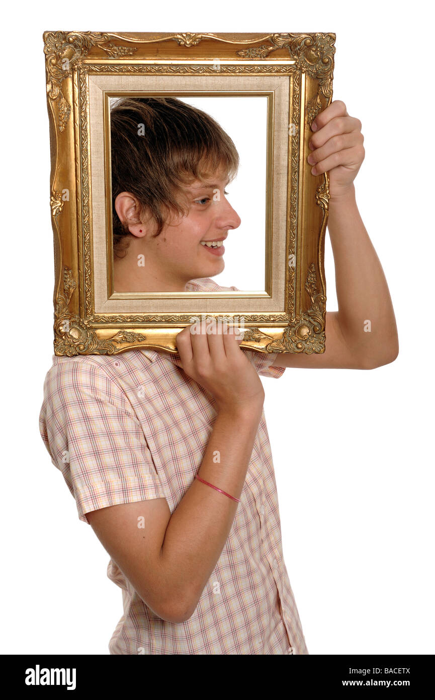 Boy holding un cadre photo Banque D'Images