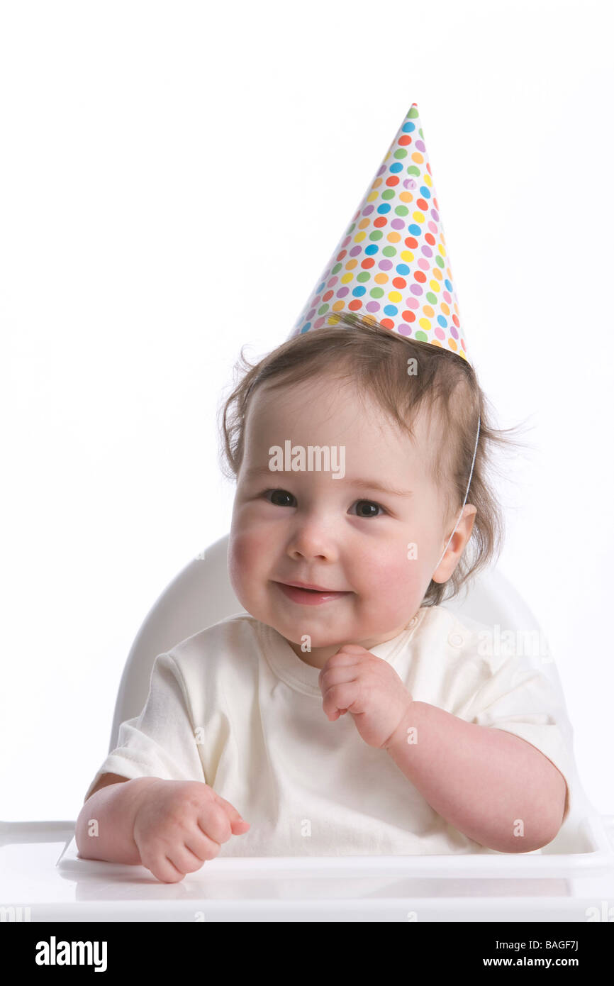 Enfant d'un an avec un parti-hat Banque D'Images Enfant d'un an avec un parti-hat Banque D'Images