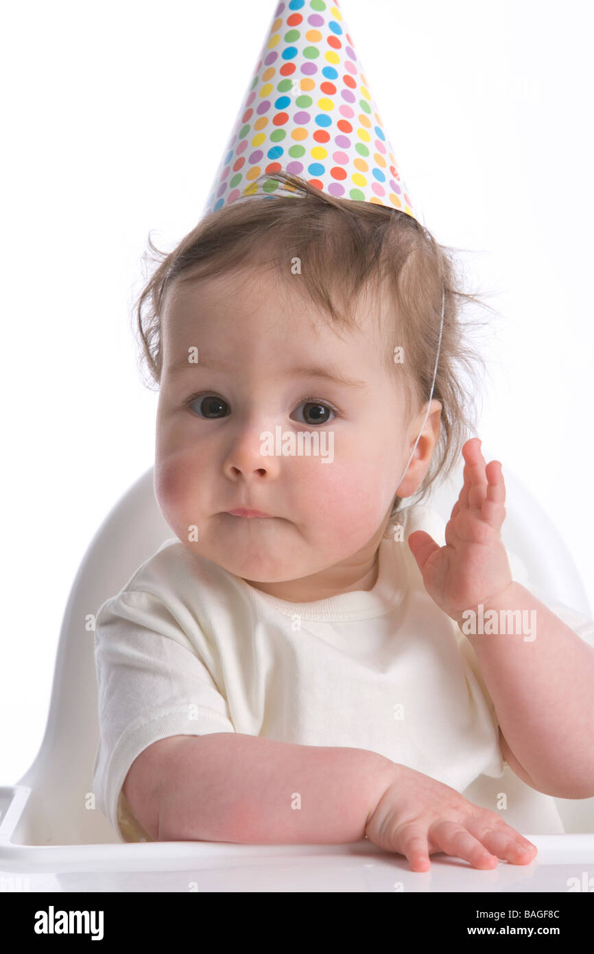 Enfant d'un an avec un parti-hat Banque D'Images Enfant d'un an avec un parti-hat Banque D'Images