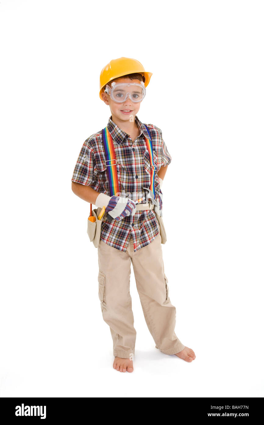 Young caucasian boy habillé en costume d'un charpentier debout sur un fond blanc Banque D'Images