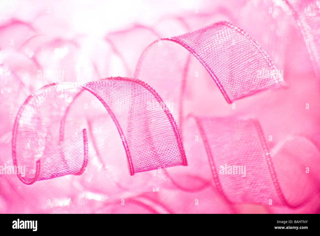 Abstract close up of pink ruban gondolé, selective focus Banque D'Images