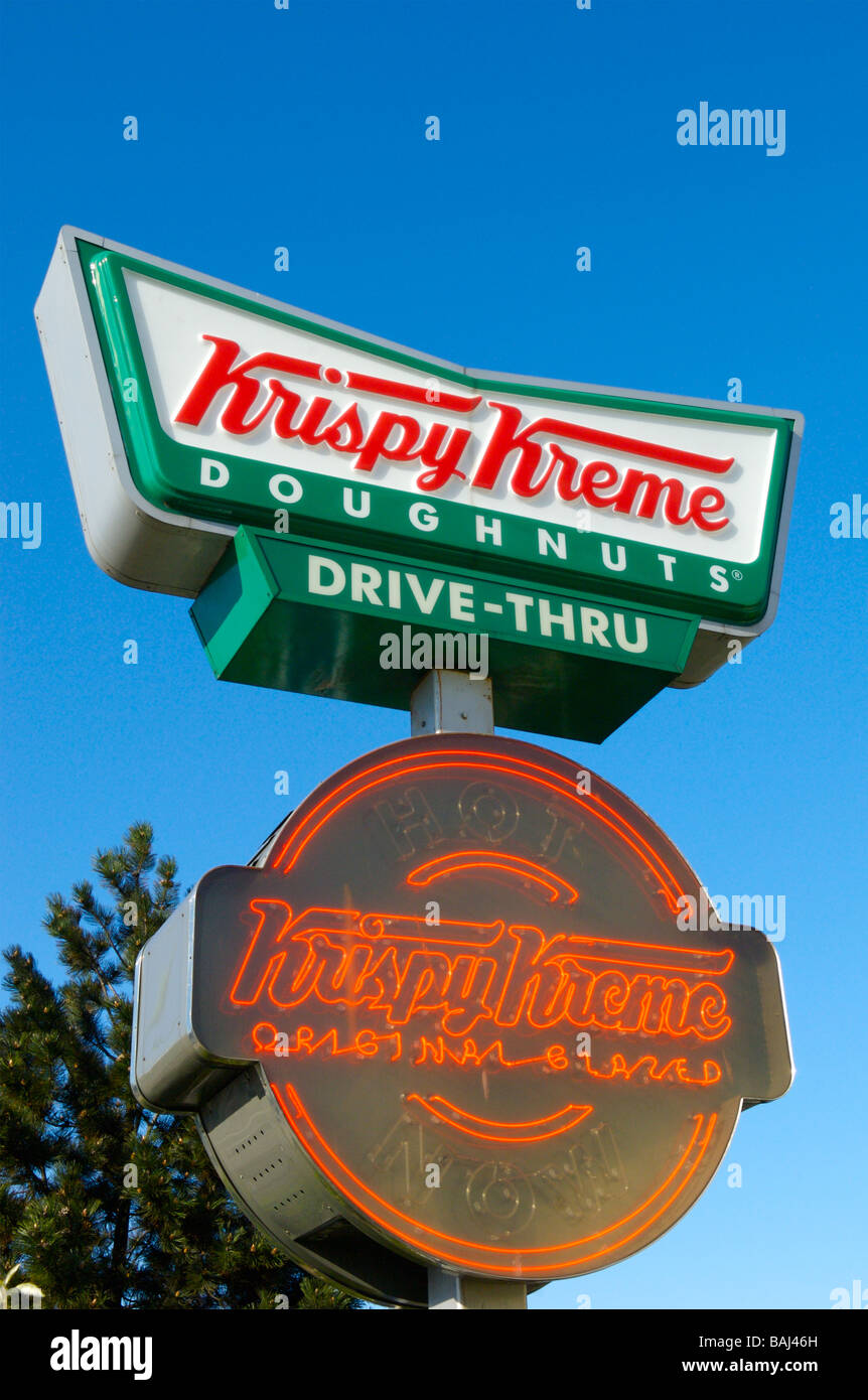 Un lecteur de beignes Krispy Kreme à emporter Banque D'Images