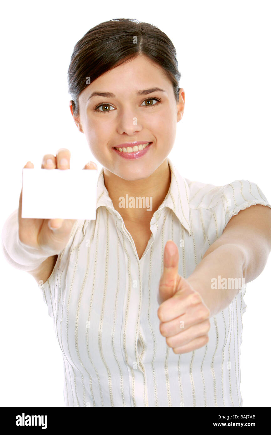 Young woman holding blank business card, faisant signe ok Banque D'Images