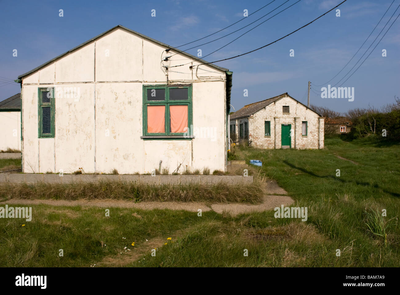 Hébergement vieux chalets à l'Observatoire d'oiseaux de repousser repousser Point East Riding of Yorkshire Angleterre Banque D'Images