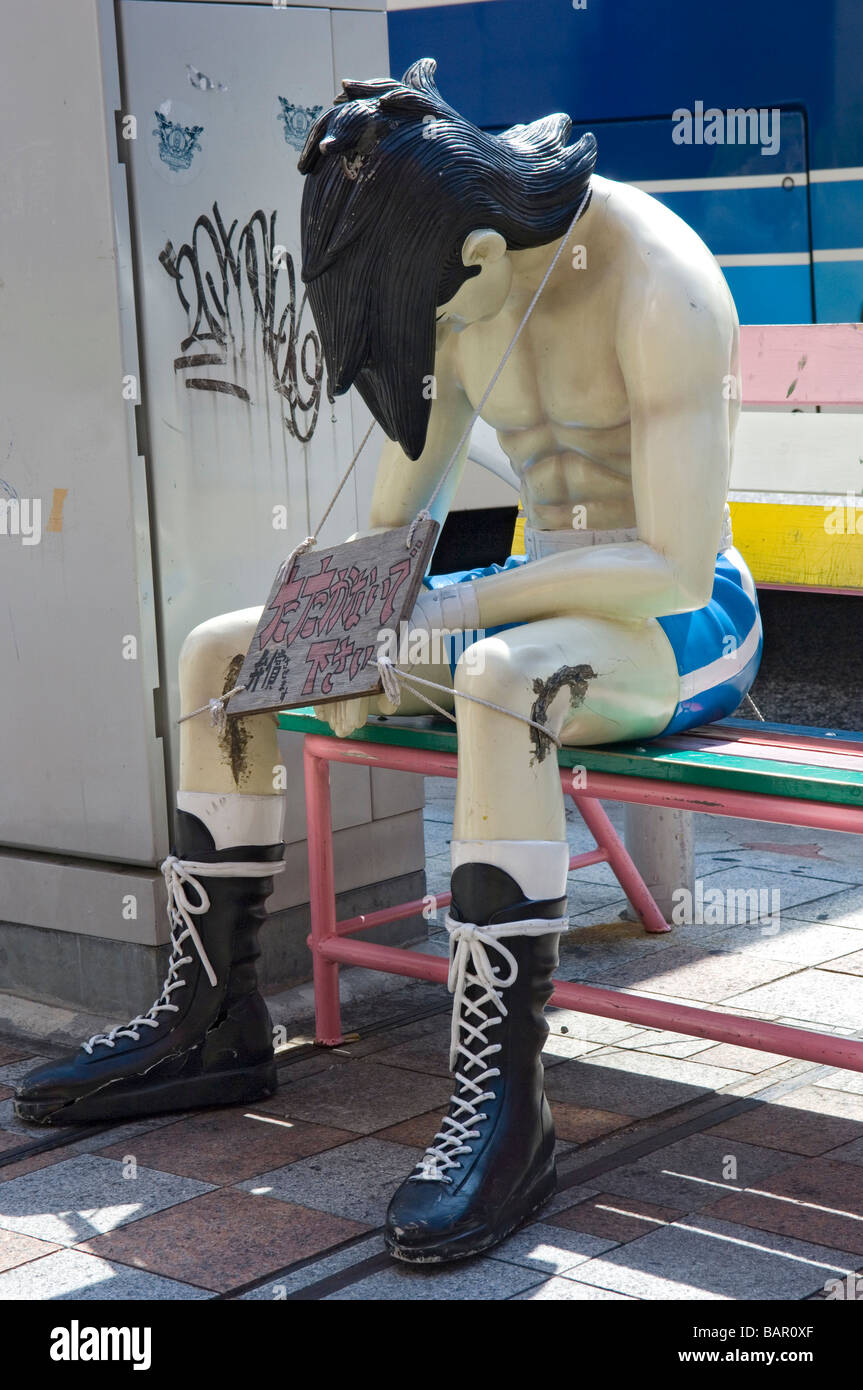 Statue d'un personnage de manga sur Kokusai Dori à Naha, Okinawa, Japon Banque D'Images
