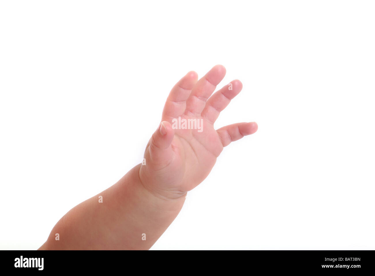 Baby Baby's hand reaching out fond blanc close up soft skin ouvrez palm petit petit garçon doux voulant nécessiteux Banque D'Images