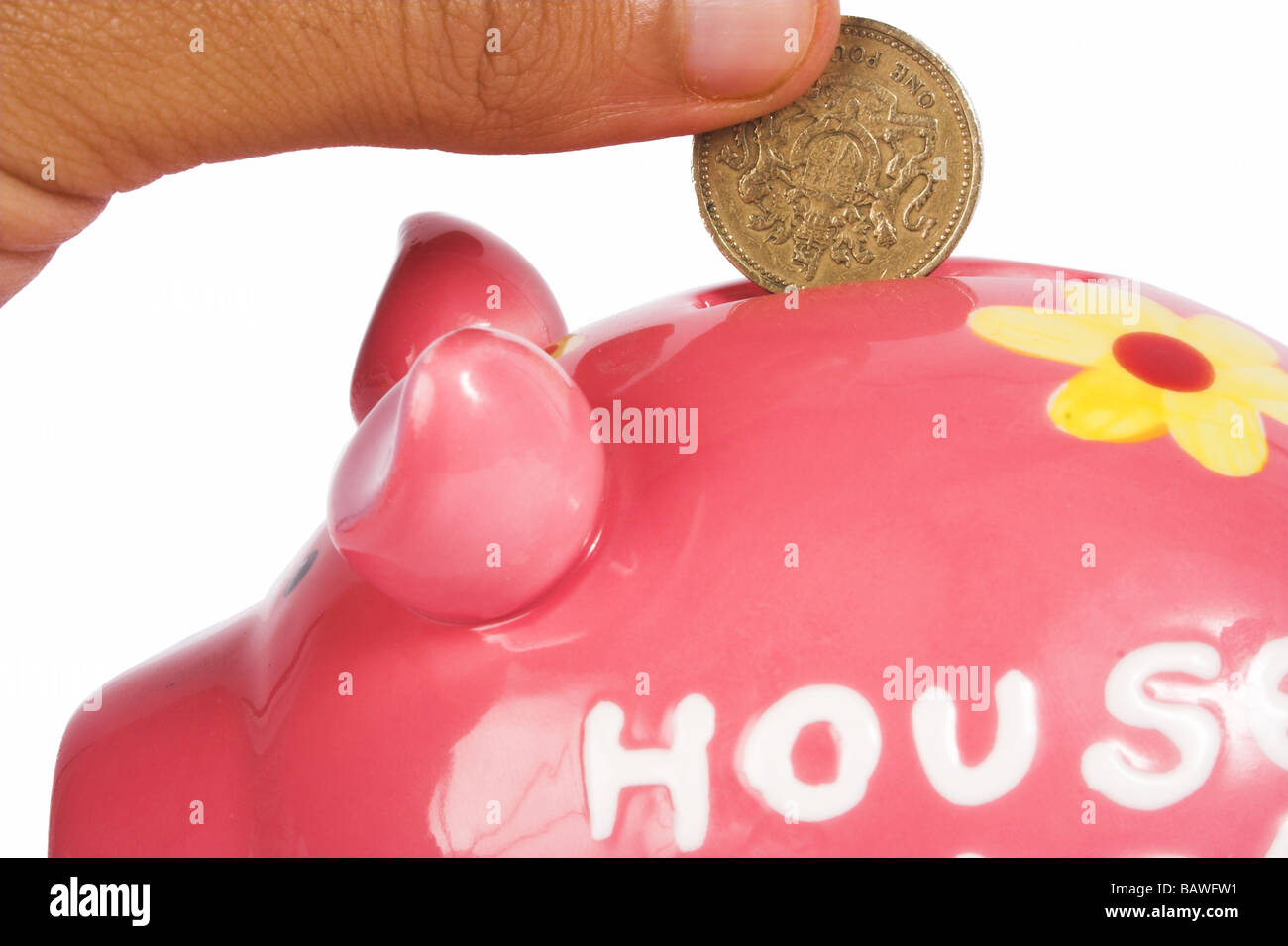 British pound in piggy bank Banque D'Images