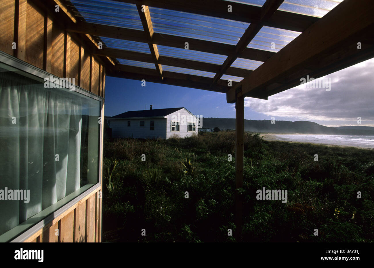 Maisons de vacances à Curio Bay, Catlin Coast, Nouvelle-Zélande Banque D'Images
