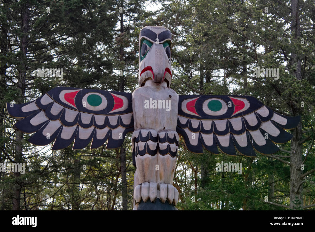 Totem sculpté à Butchart Gardens Victoria British Columbia Canada Banque D'Images
