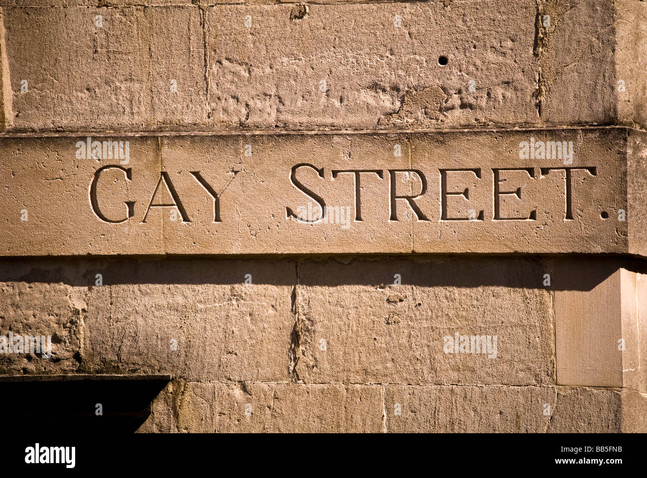 Le nom 'gay' dans la rue baignoire sculptée dans la pierre. Banque D'Images