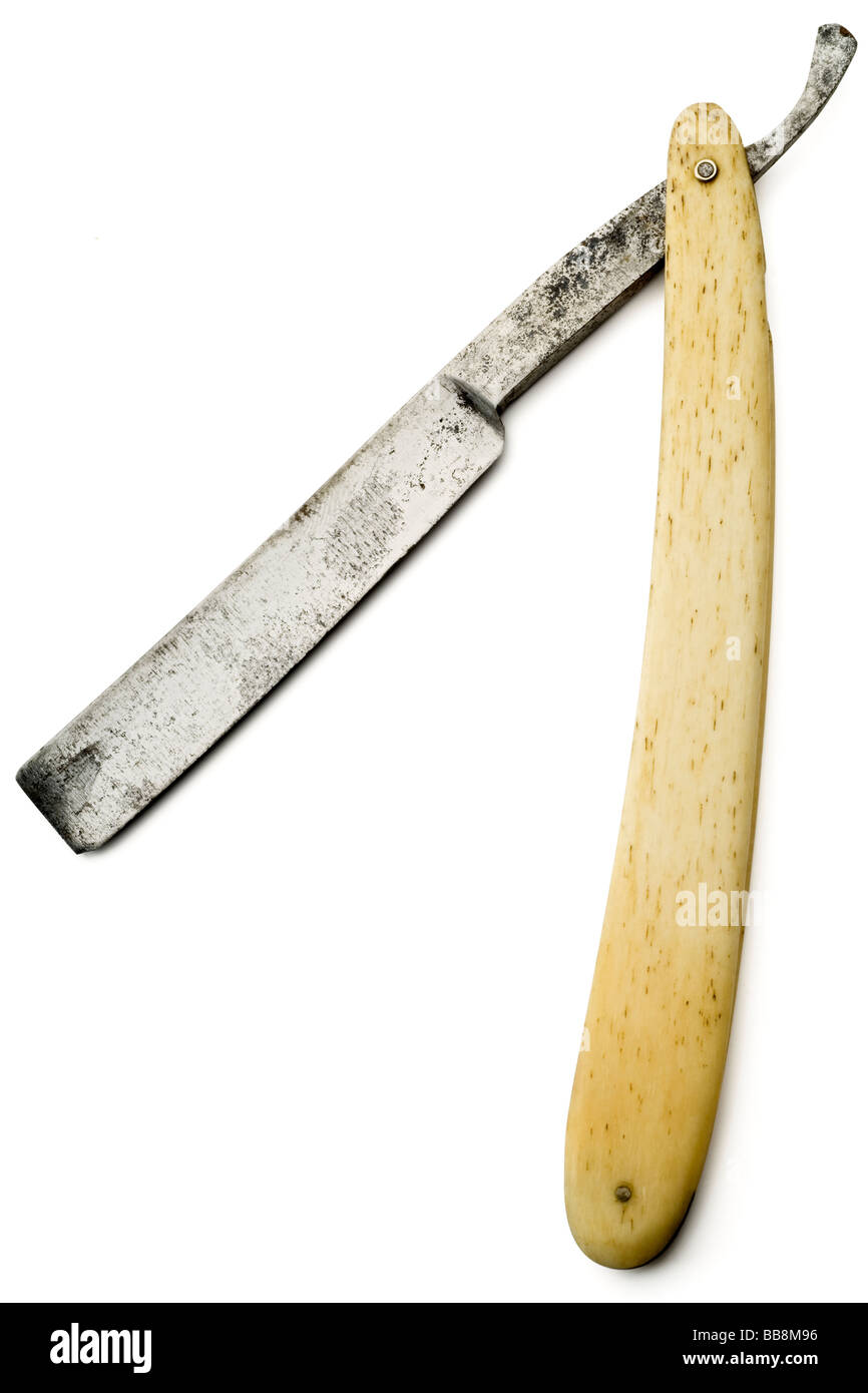 Un vieux rusty razor on white with clipping path Banque D'Images
