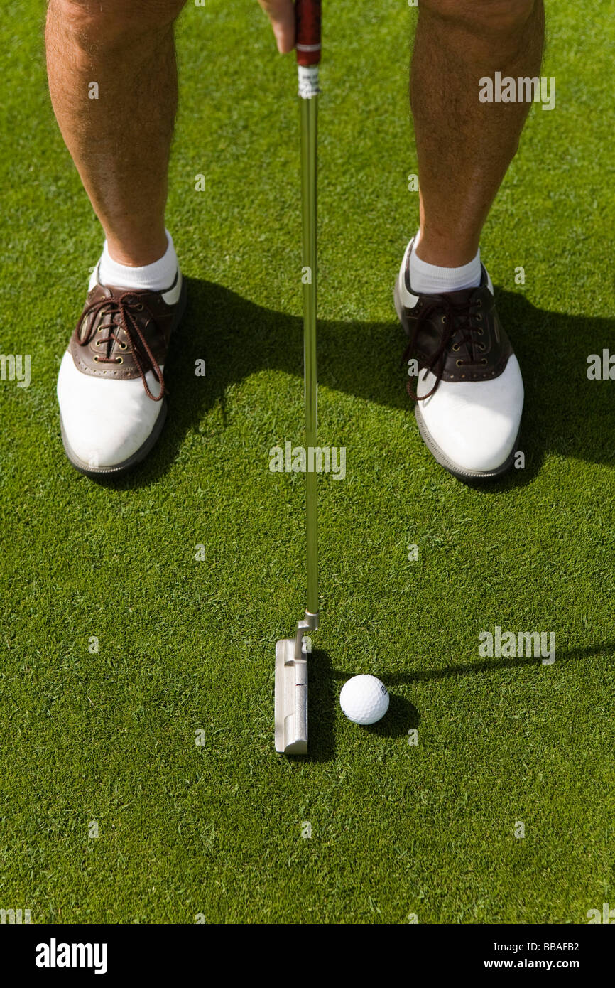 Détail d'un golfeur mettre Banque D'Images