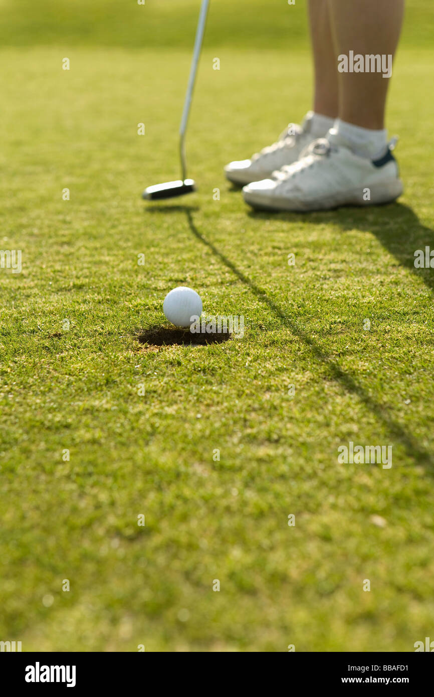 Détail d'un golfeur mettre Banque D'Images