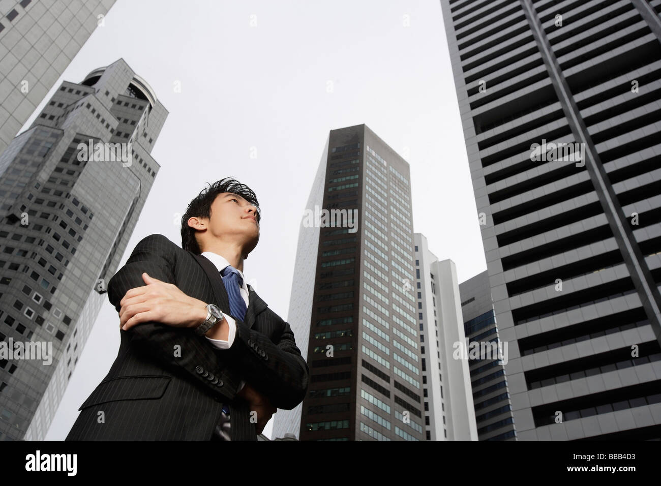 Businessman with arms crossed Banque D'Images