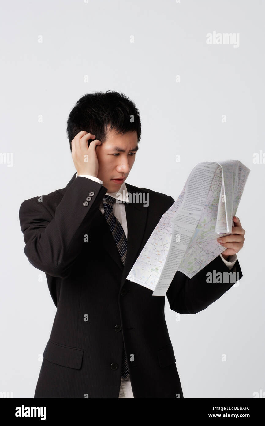 Homme avec carte Banque D'Images