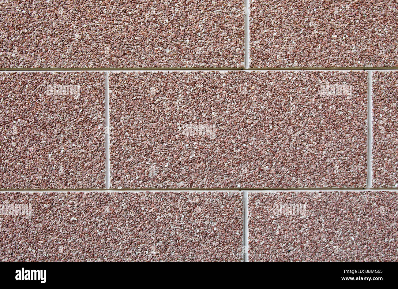 Abstract brown wall texture faite de beaucoup de petites pierres. Marbre Granit gravier stone wall texture texturé Banque D'Images