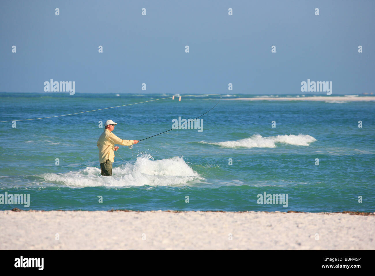 Pêche Surf Casting Anna Maria Island Floride Golfe du Mexique, la pêche sportive Banque D'Images