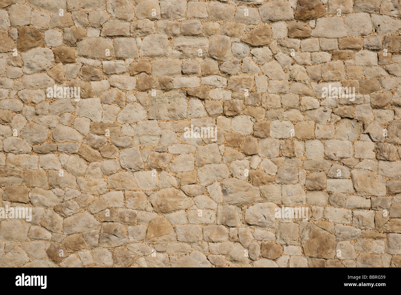 Vieux Mur de pierre comme arrière-plan approprié avec des motifs et texture Banque D'Images