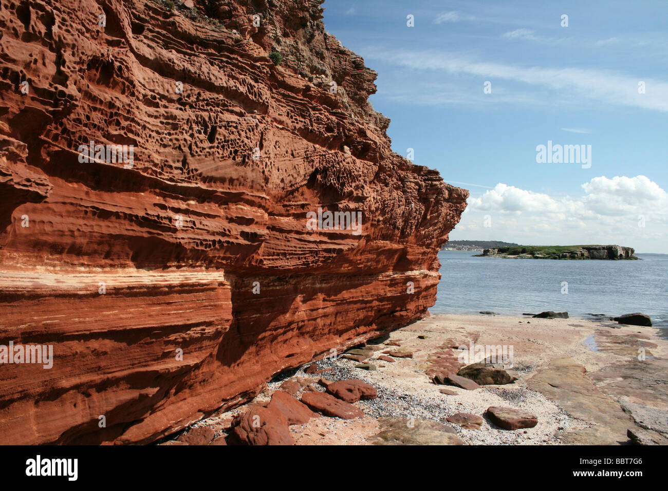 Falaise de grès Bunter Hilbre Island, sur un site d'intérêt scientifique, le Wirral, Merseyside, Royaume-Uni Banque D'Images