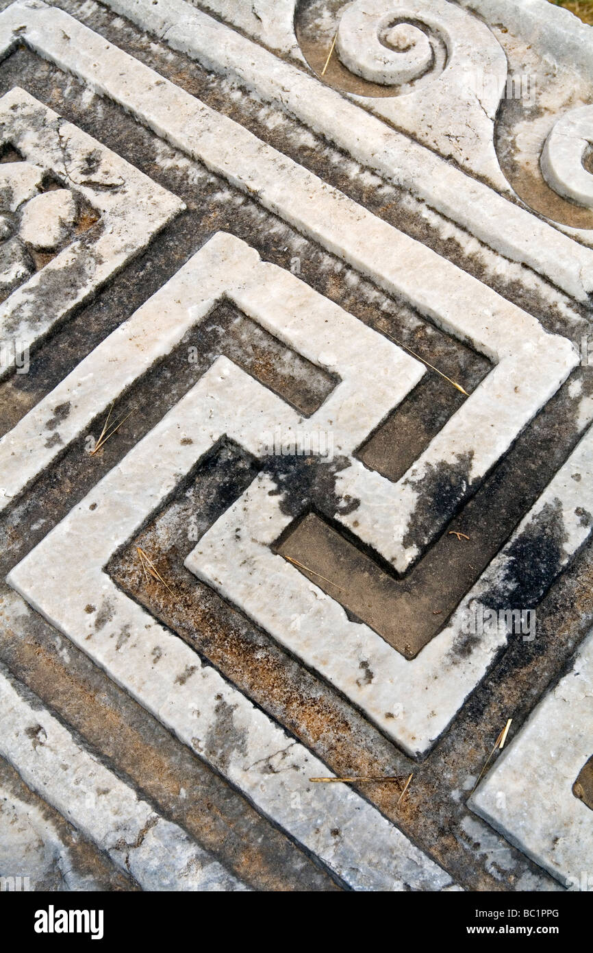 Détail de dessins ornementaux dans les ruines de l'Agora une ancienne ville grecque et romaine dans le Dodécanèse île de Kos en Grèce Banque D'Images