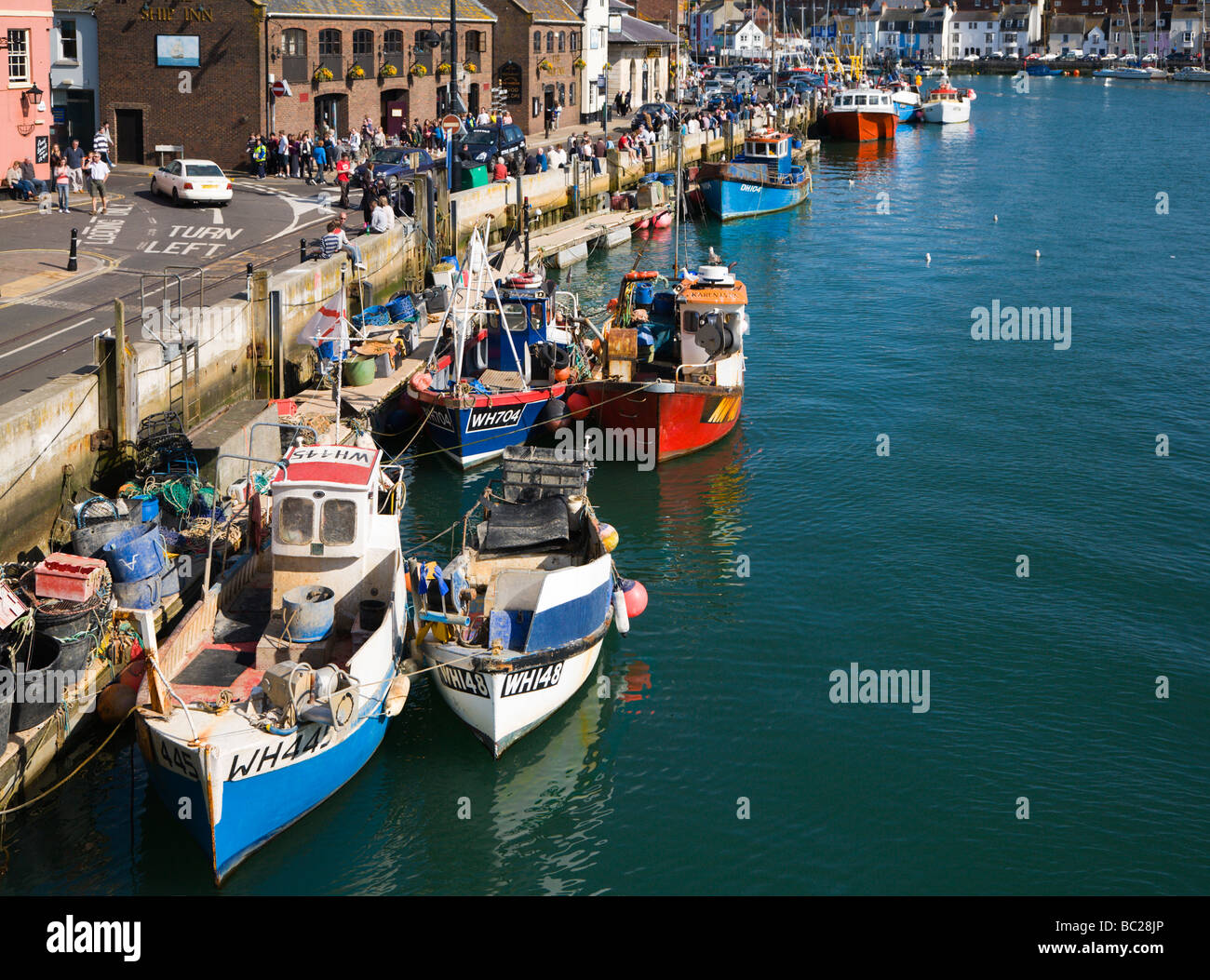 Les bateaux de pêche et chalutiers amarrés au quai. Port de Weymouth. Le Dorset. UK. Banque D'Images