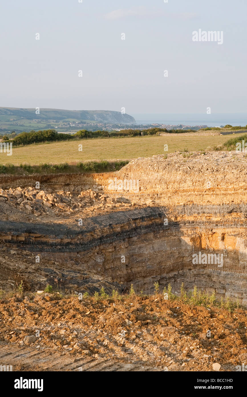 Carrière de calcaire à ciel ouvert de travail sur l'île de Purbeck, Dorset, UK Banque D'Images