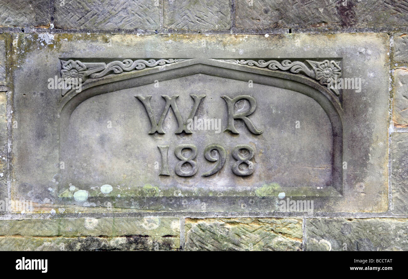 William Robinson initiales gravées sur le mur de la Cuisine Jardin Gravetye Manor East Sussex Banque D'Images