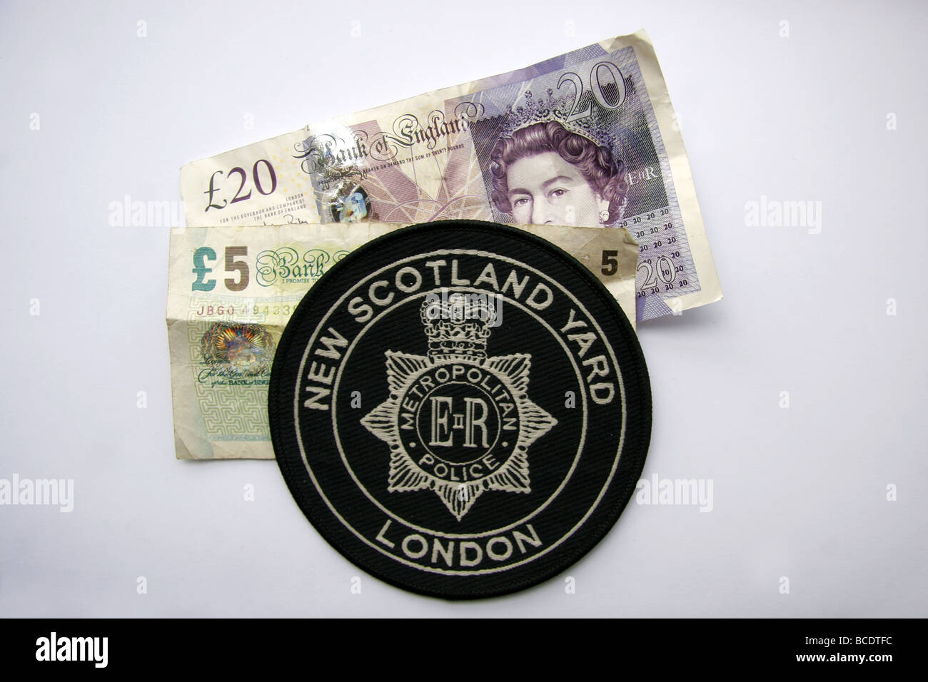 London Metropolitan Police patch New Scotland Yard et en argent Banque D'Images