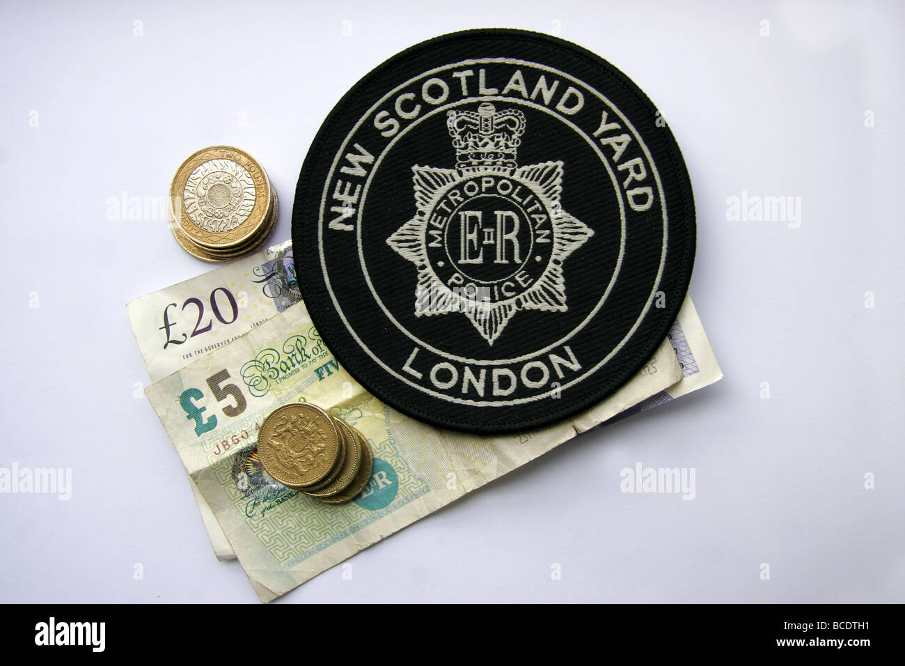 London Metropolitan Police patch New Scotland Yard et en argent Banque D'Images