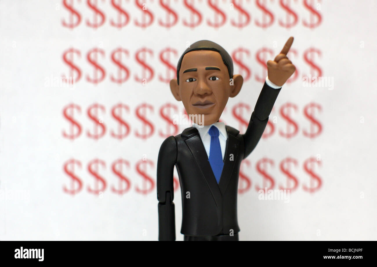 Barack Obama action figure avec le signe dollar Banque D'Images