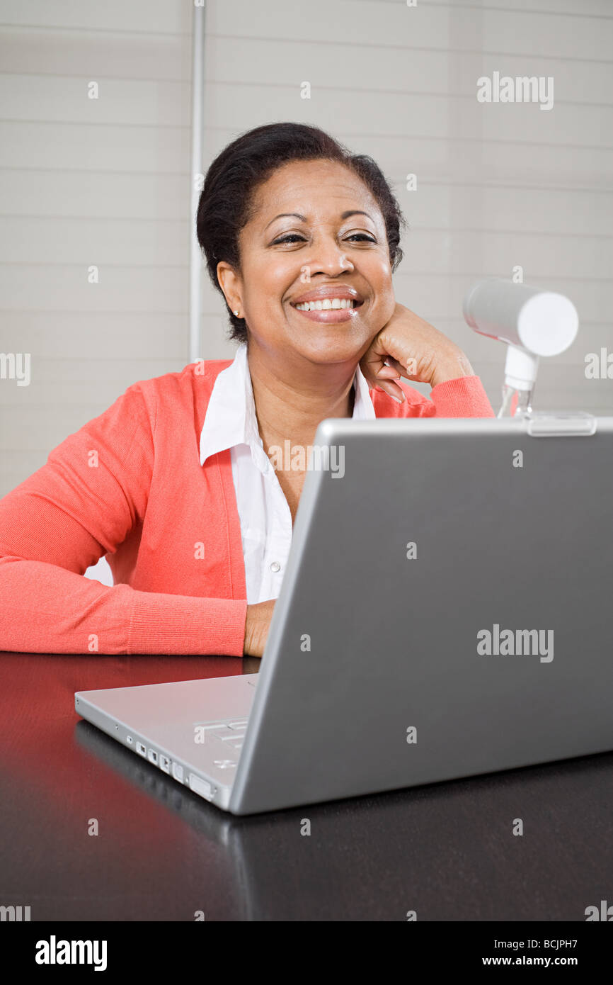 Mature Woman using webcam Photo Stock - Alamy