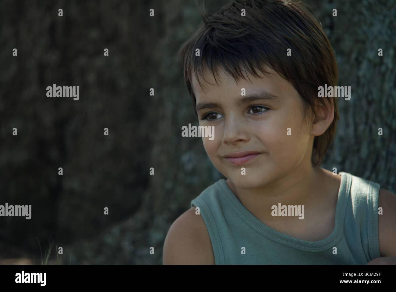 Little Boy smiling outdoors, portrait, close-up Banque D'Images