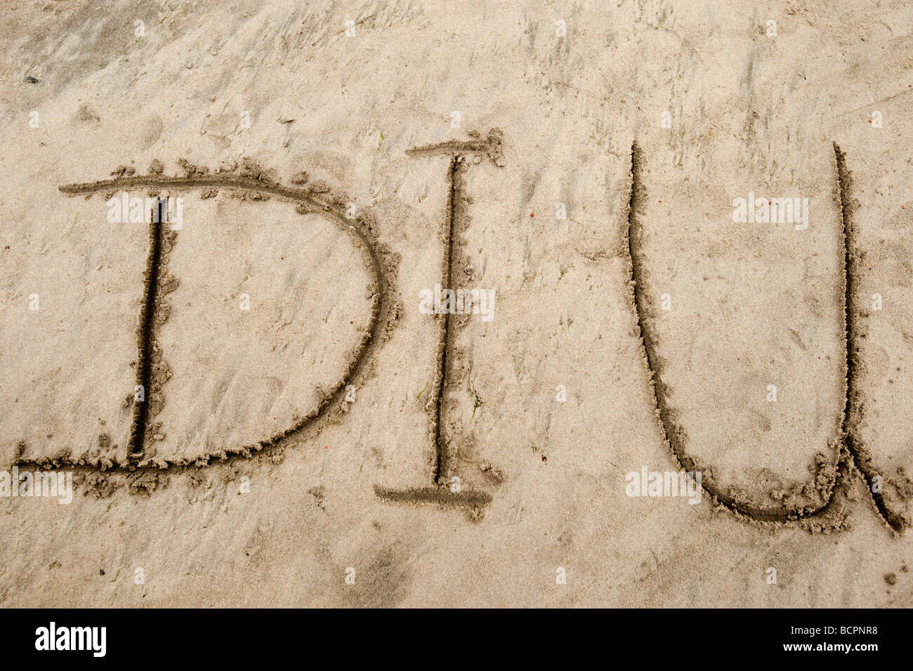 Sable Plage de Nagoa écrit Diu Diu, Inde Banque D'Images