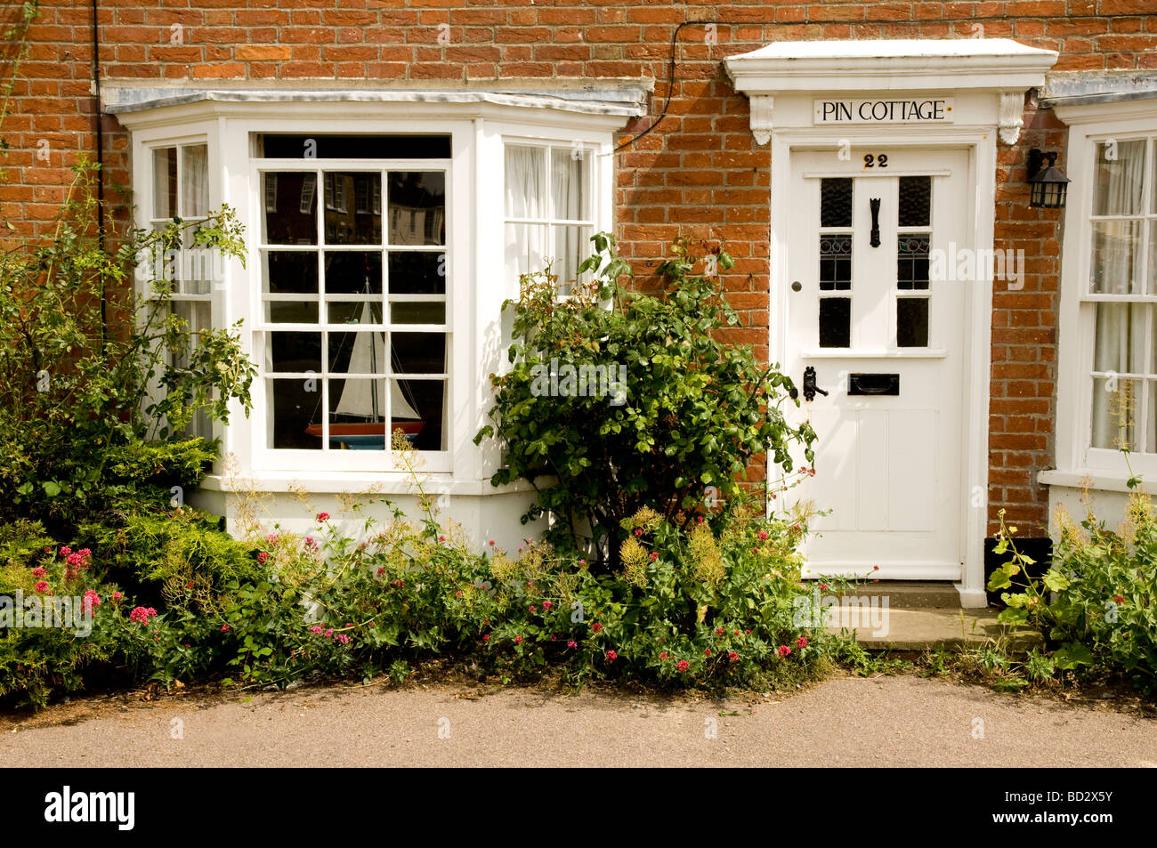 Petit rouge brique seaside cottage à Southwold, Suffolk Banque D'Images