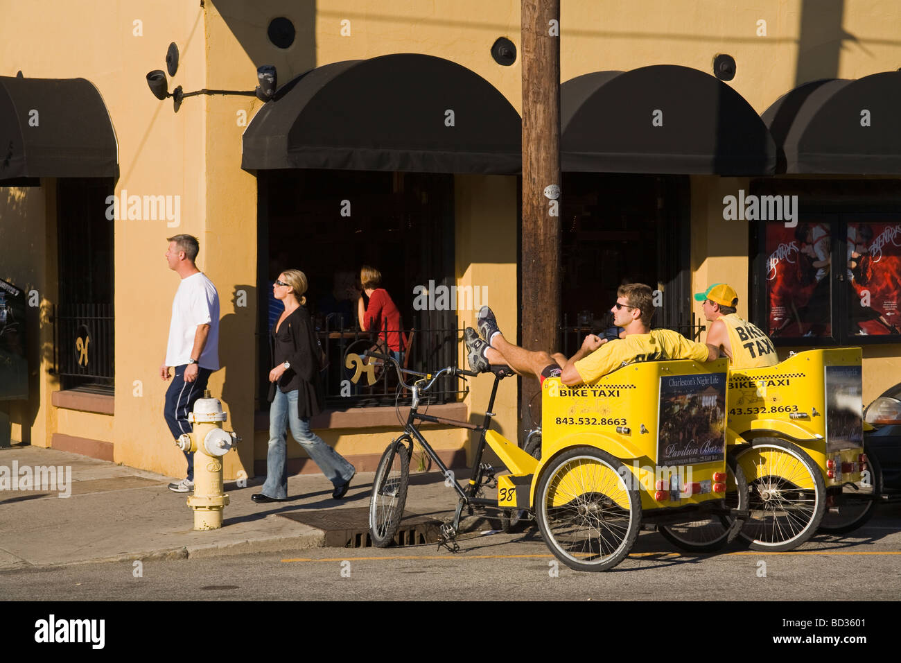 Vélo-taxi sur Market Street Charleston en Caroline du Sud USA Banque D'Images