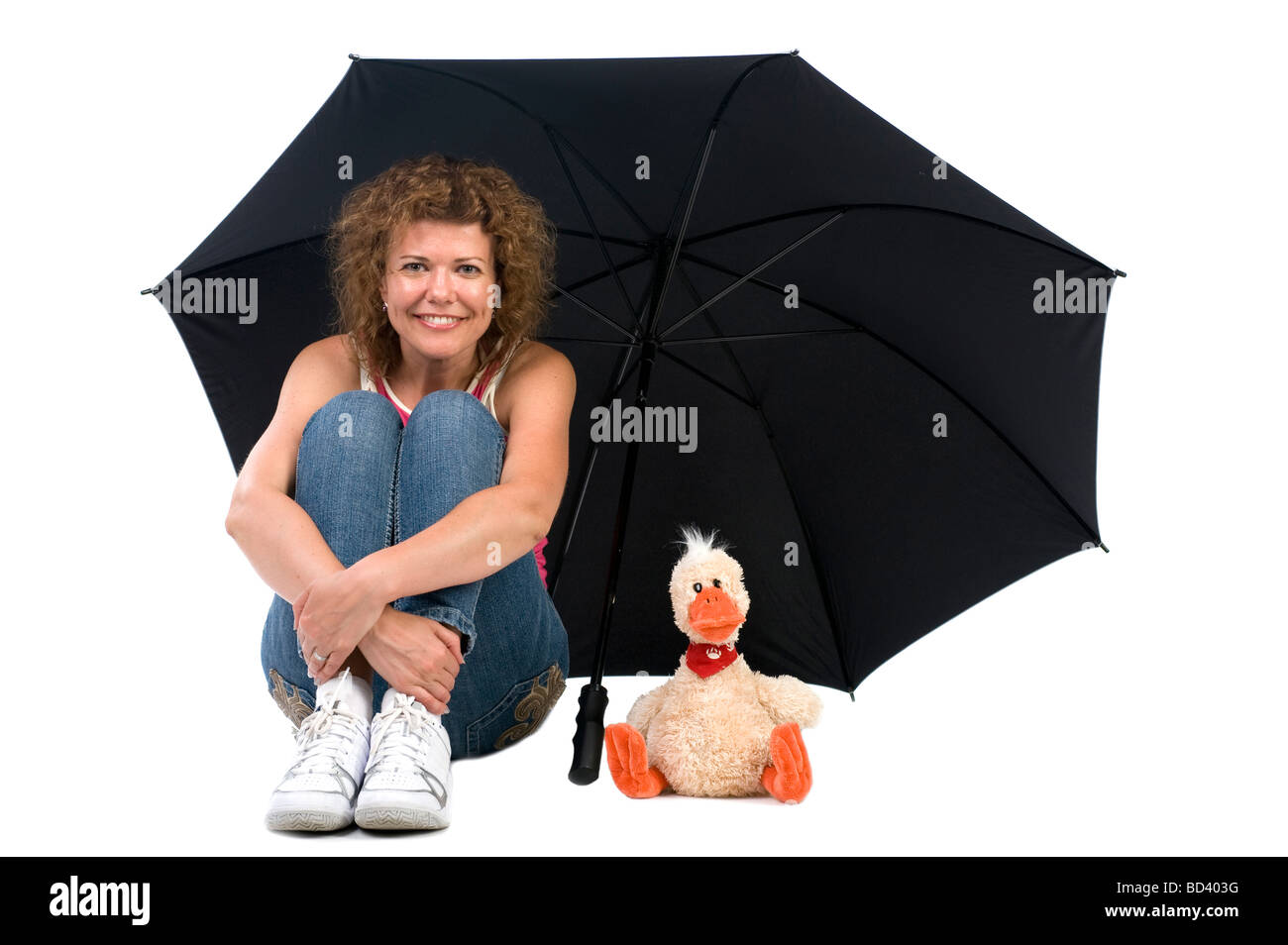 Objet sur sports blanc femme avec parapluie Banque D'Images