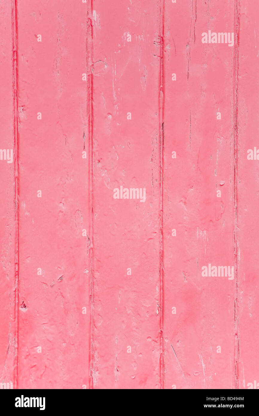 Gros plan du bois avec peinture rose Banque D'Images