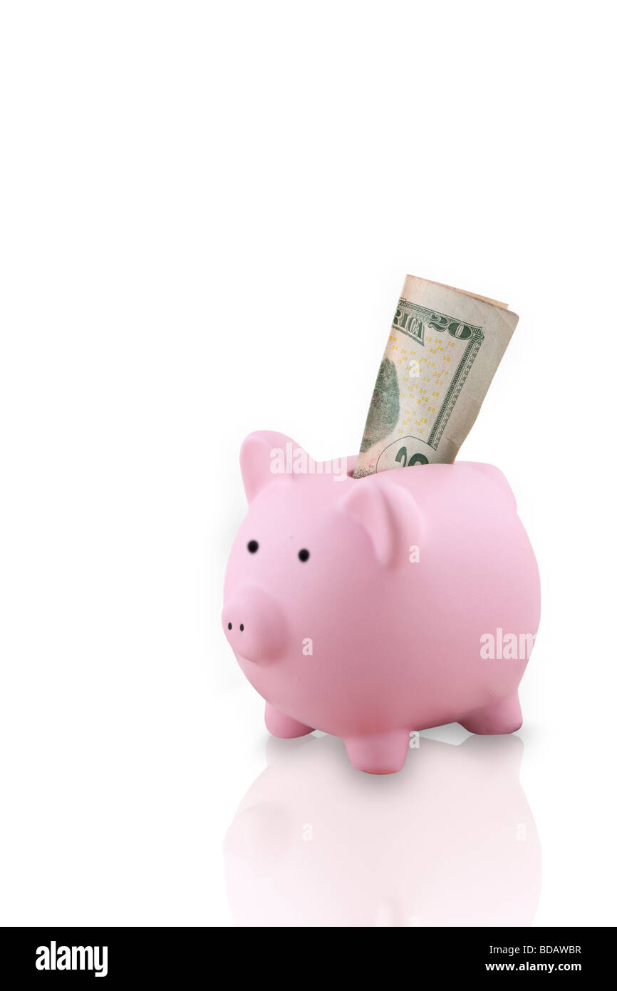 Pink Piggy Bank isolé sur fond blanc et a une 20 dollar bill sticking out Banque D'Images