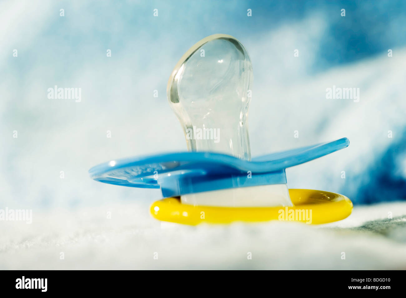 La succion de la sucette Banque D'Images