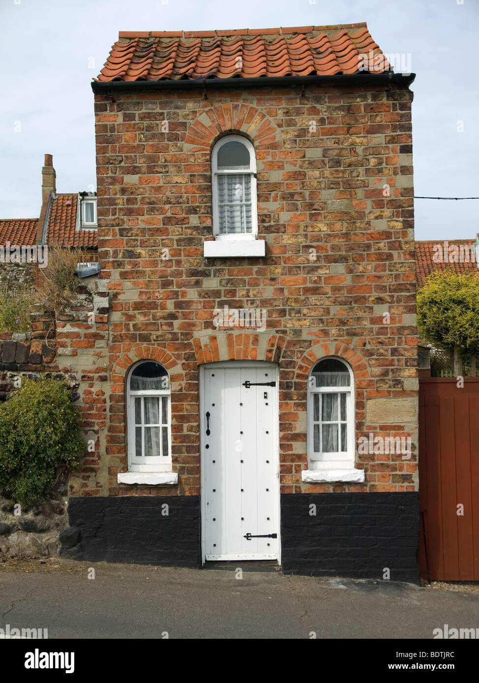 Une petite maison individuelle maison en brique à Wells next the Sea North Norfolk Banque D'Images
