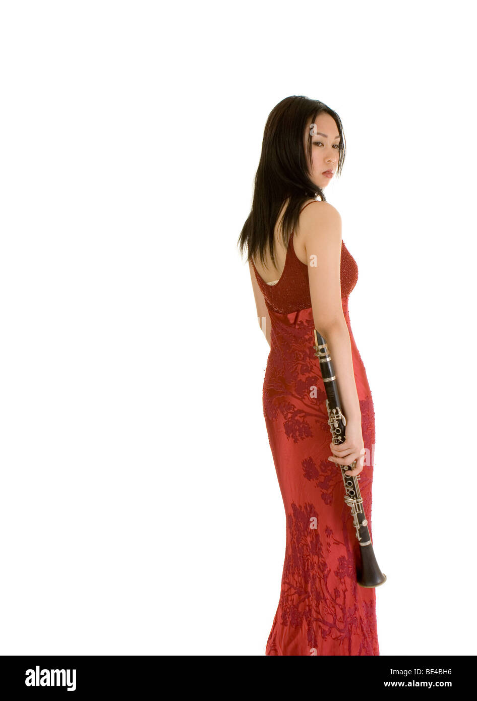Young Asian woman avec clarinette Banque D'Images