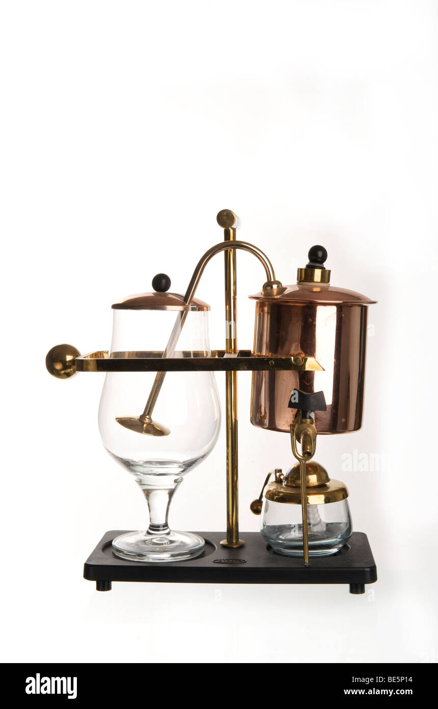 Vieille machine à café, fait de verre, cuivre et laiton, et d'une lampe à alcool Banque D'Images