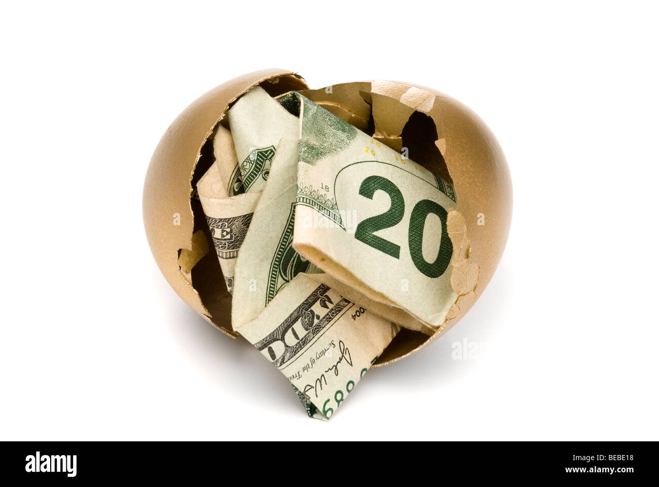 L'éclosion d'un œuf d'or révèle un peu d'argent pour la retraite. Banque D'Images