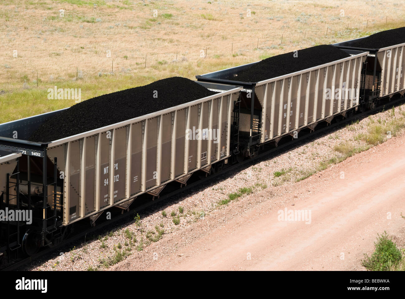 Les wagons chargés de charbon transportés de mines à proximité de centrales électriques dans le Wyoming Banque D'Images