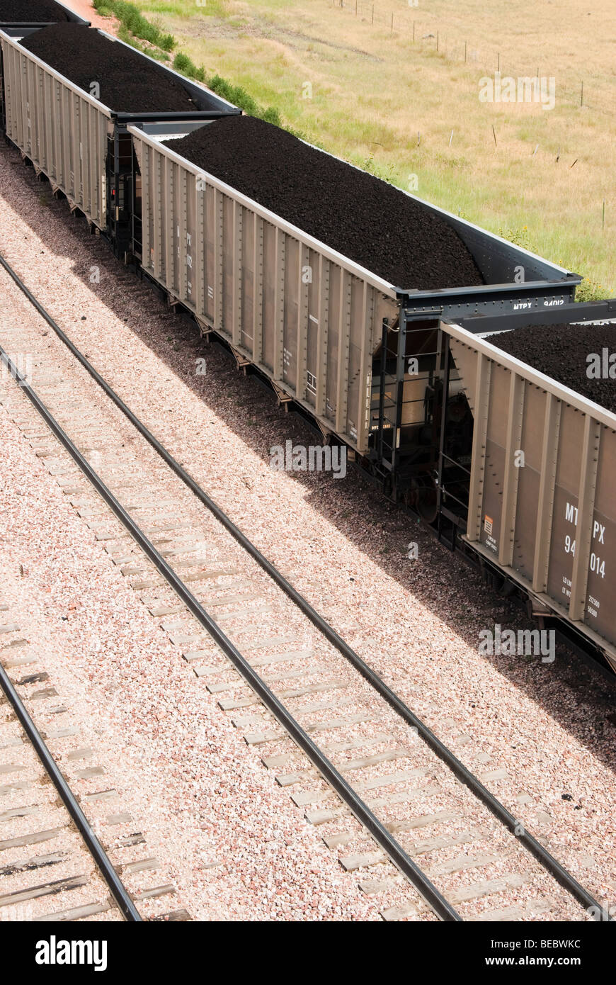 Les wagons chargés de charbon transportés de mines à proximité de centrales électriques dans le Wyoming Banque D'Images