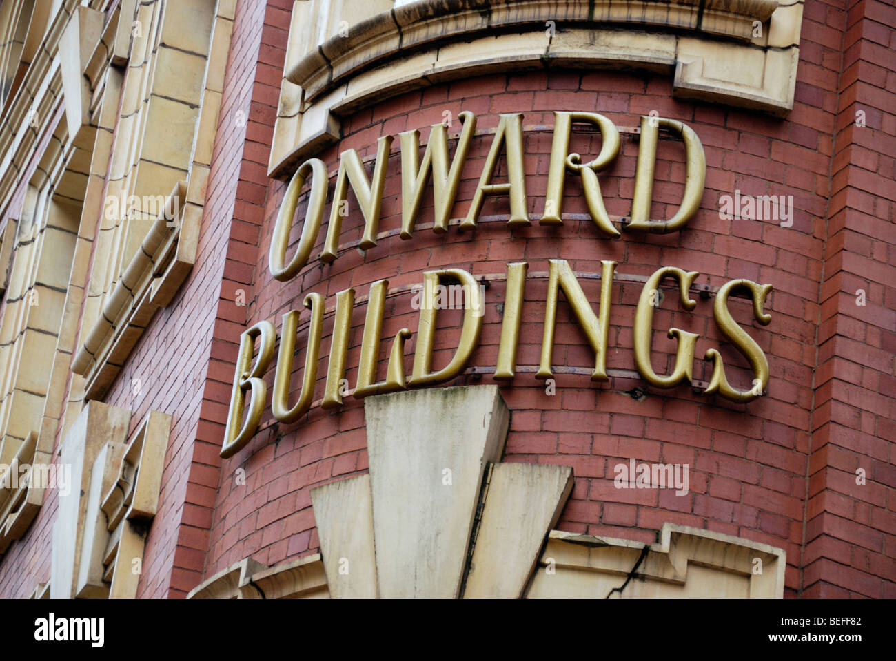 Les bâtiments, signe sur un bâtiment d'époque à Manchester, Angleterre, RU Banque D'Images