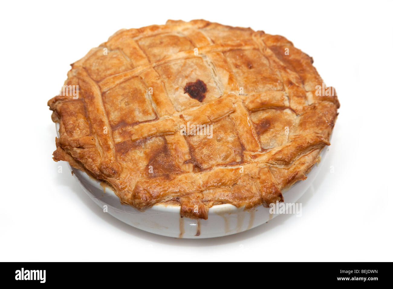 Steak and kidney pie isolated on a white background studio. Banque D'Images